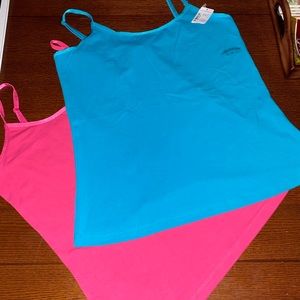 Two brand new tanks never worn